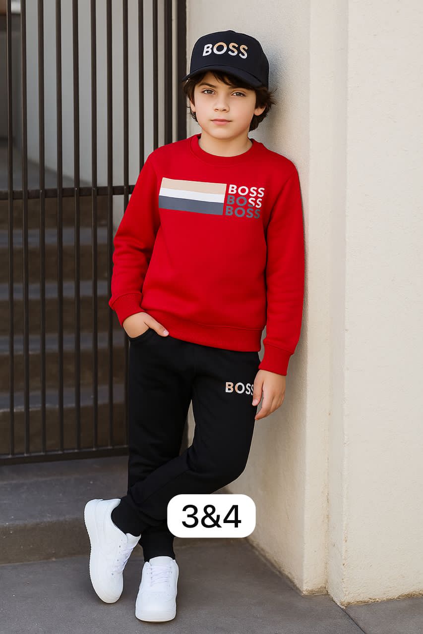 HUGO brand, specifically a boys' sweatshirt and joggers set.